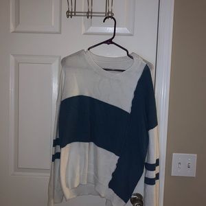 Sweater with a vertical stitching